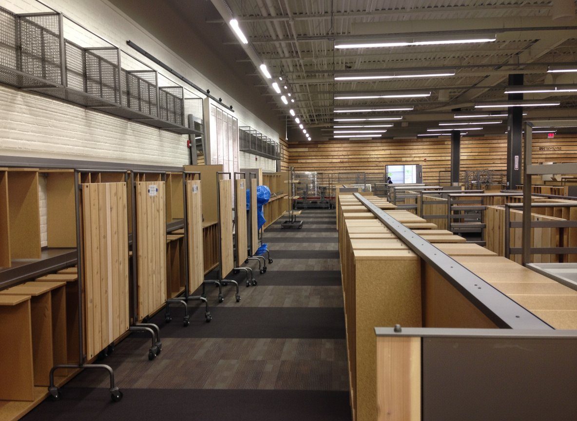 DSW merchandising wall construction, Ithaca, NY